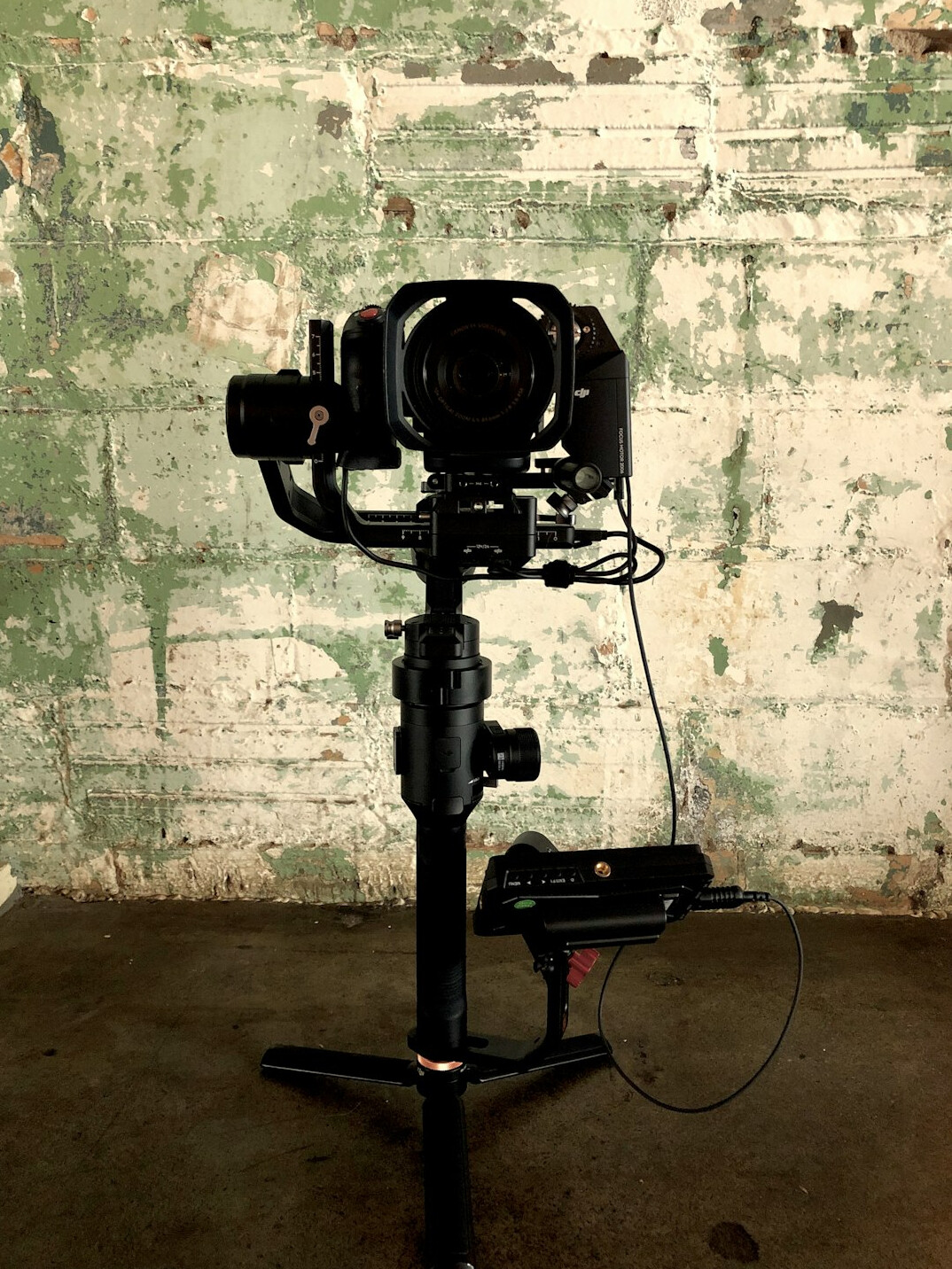 Cinema camera mounted on a handheld gimbal stabiliser